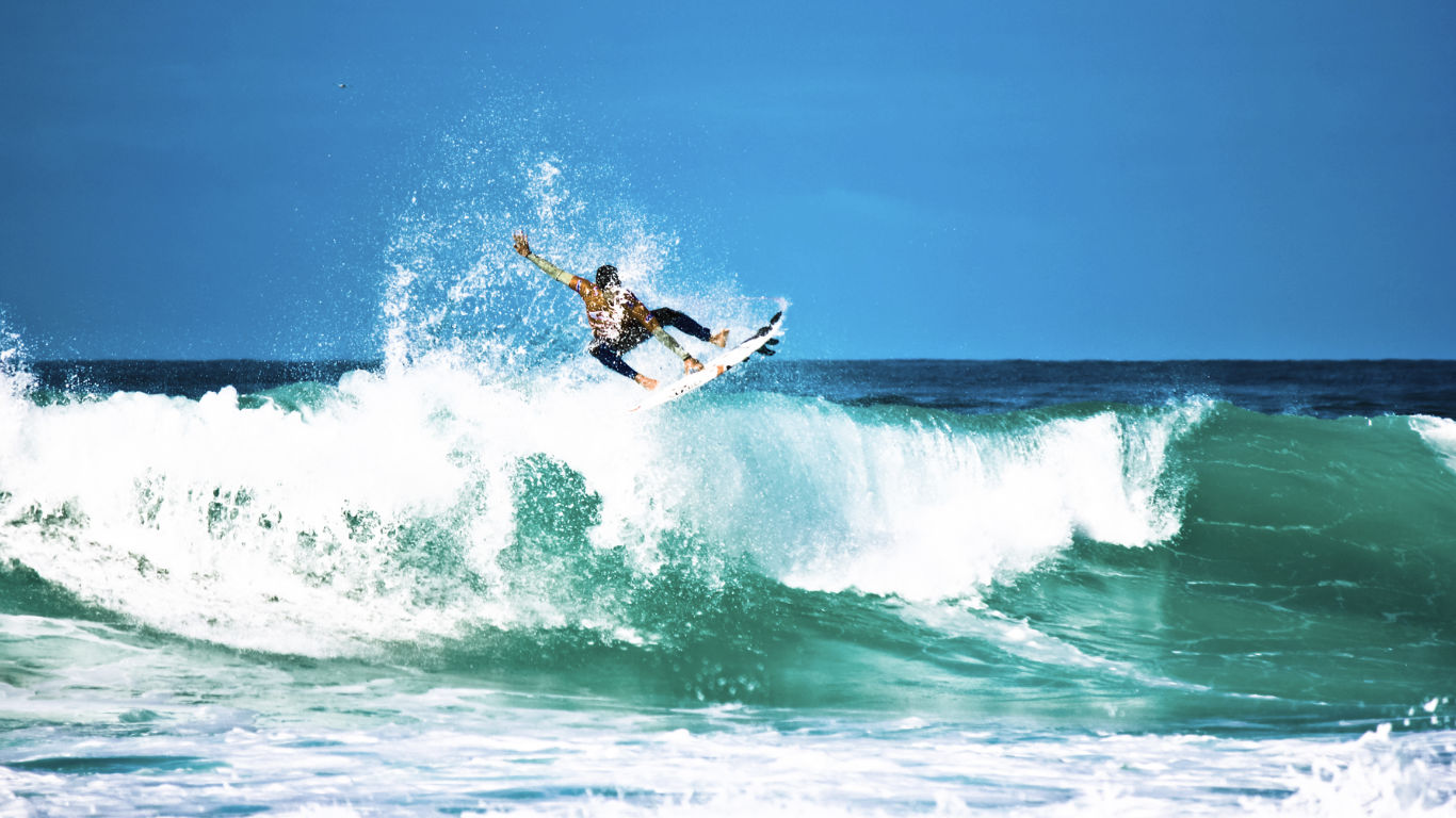 Surfer riding a wave in Hossegor